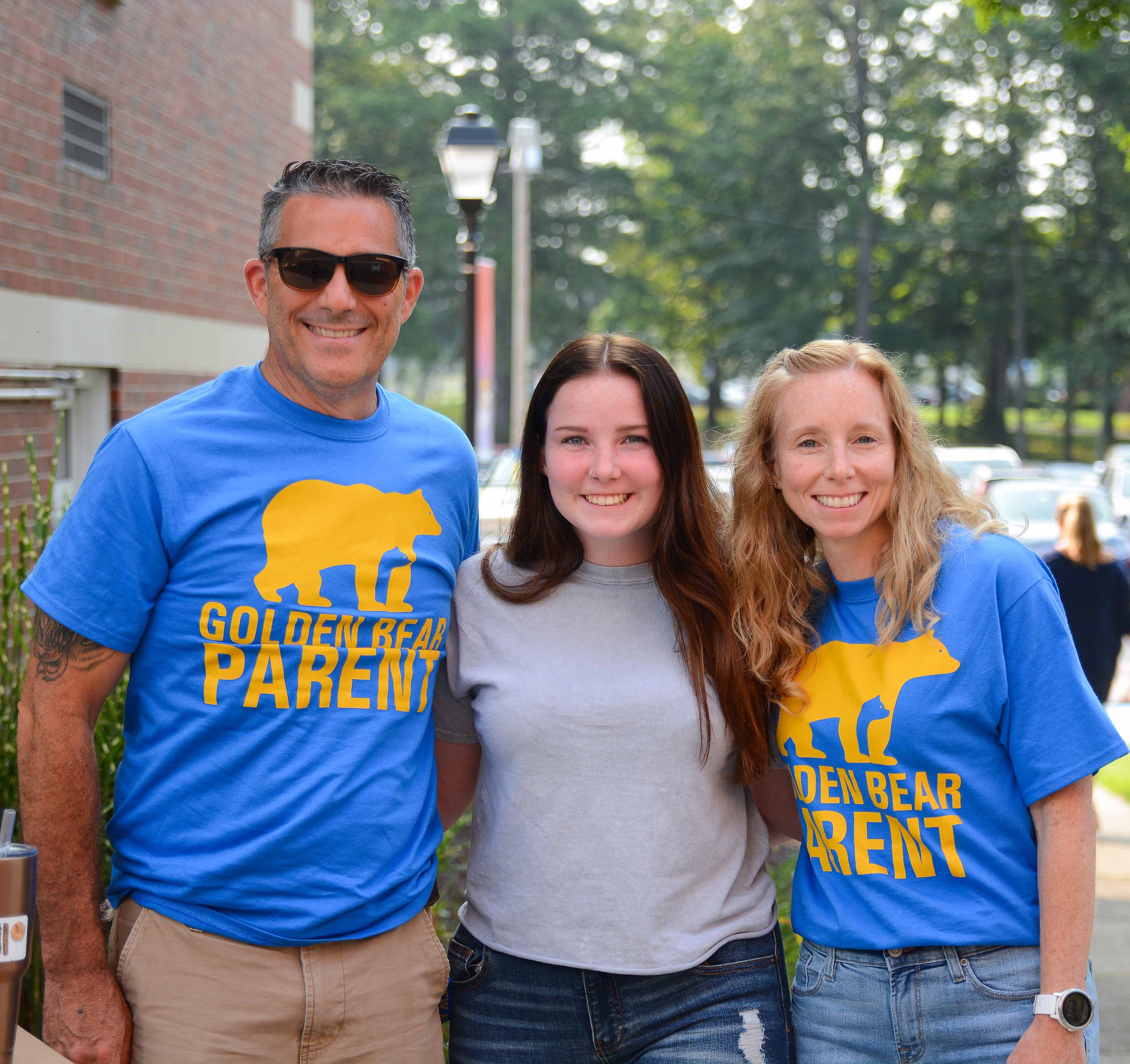Parents with their child at Move-in Day