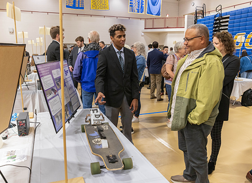 Student presenting at engineering expo