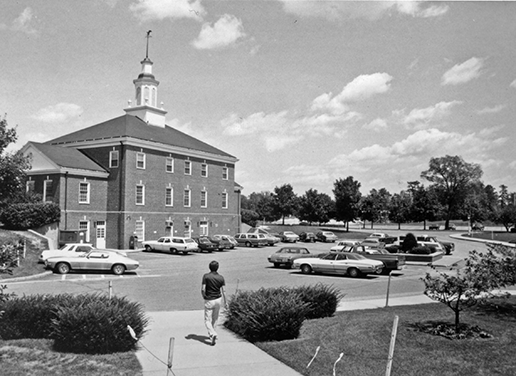 Deliso Hall with parking lot behind it