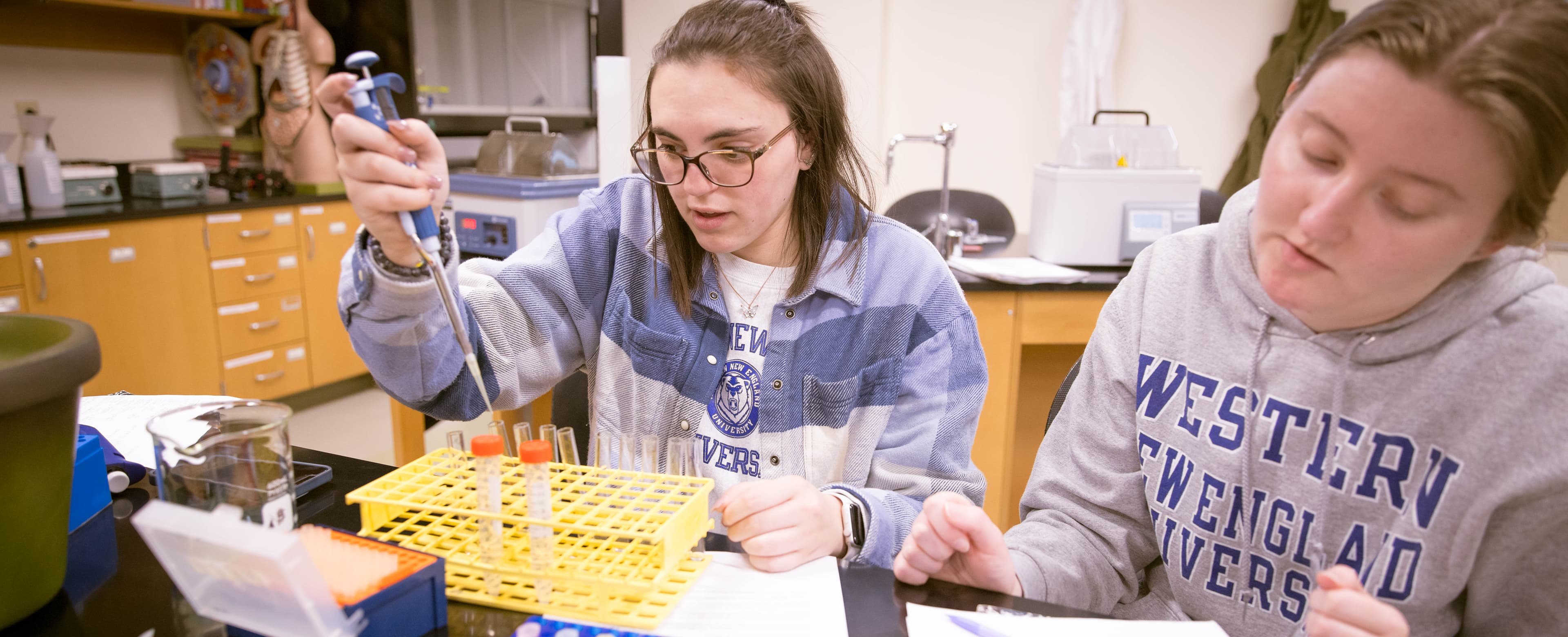 Two female students in biology lab