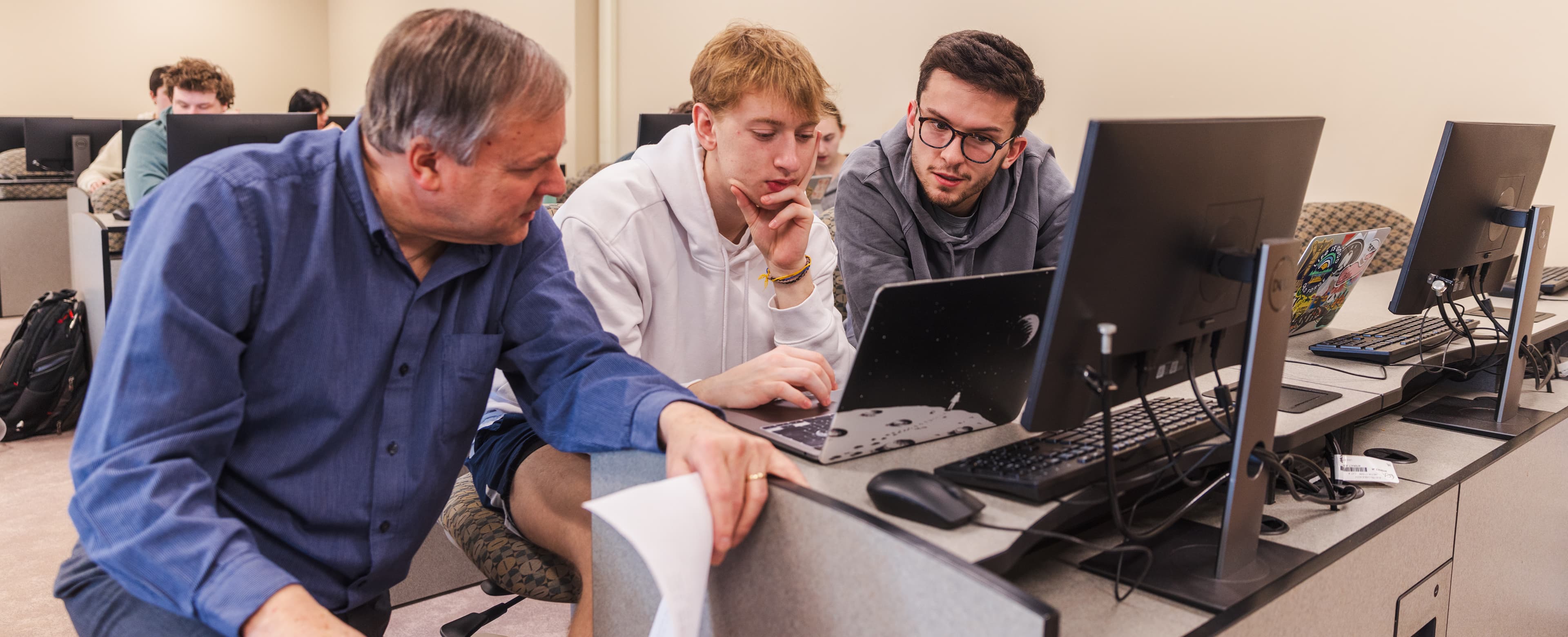 Professor working with student