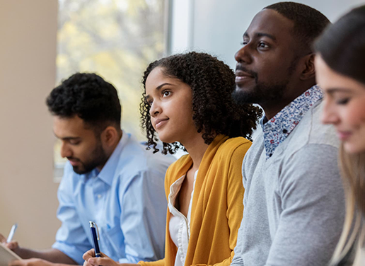 Four people in a meeting