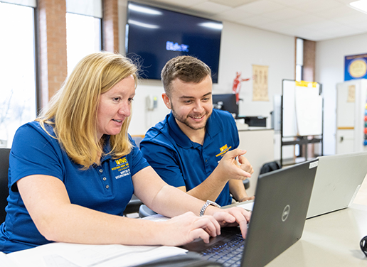 students at laptop
