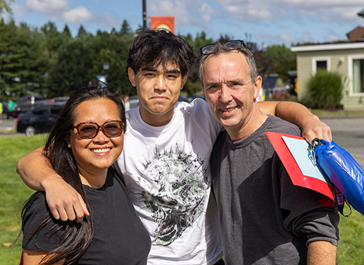 Parents with their child at move-in day