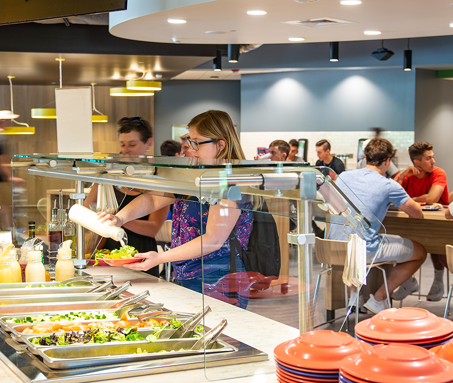 Student at salad bar in the dining hall