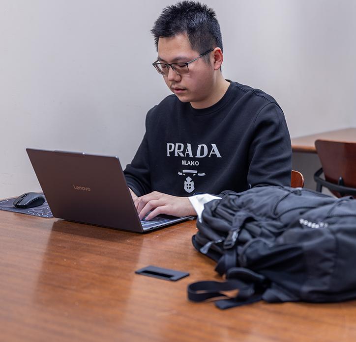 Student working at laptop