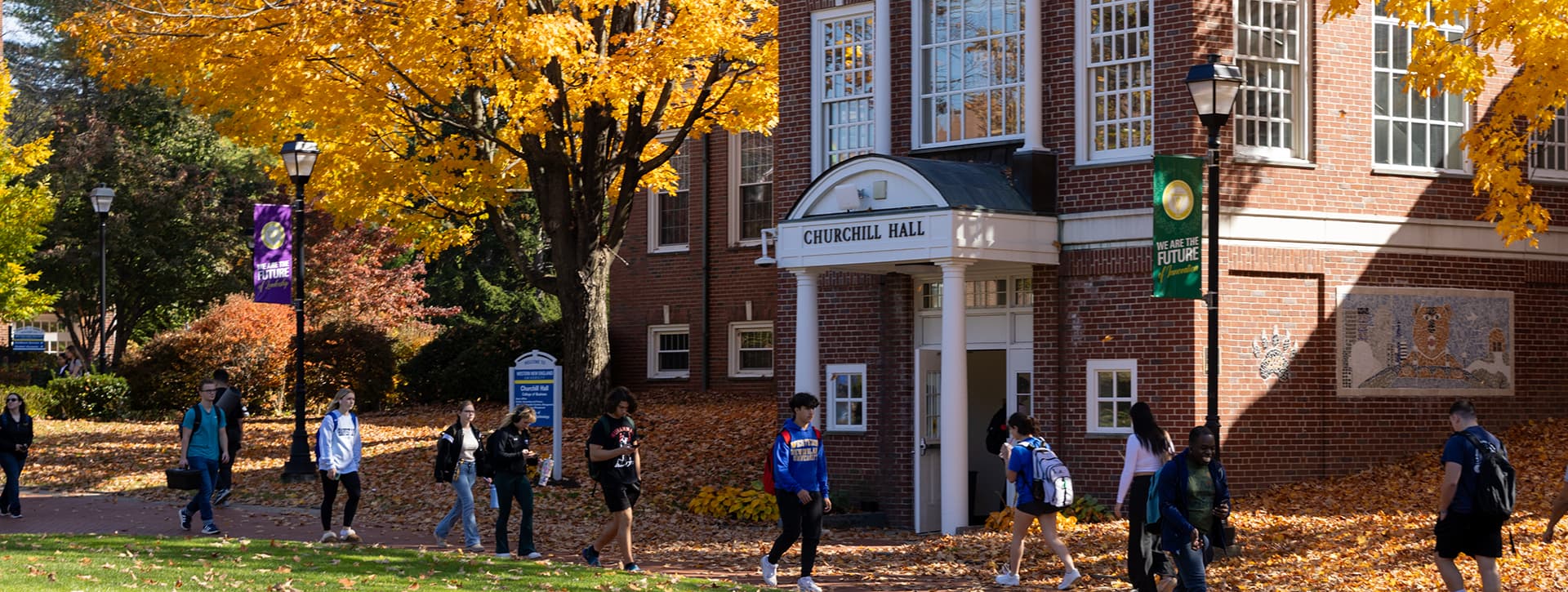 Students walking in front of Churchill Hall