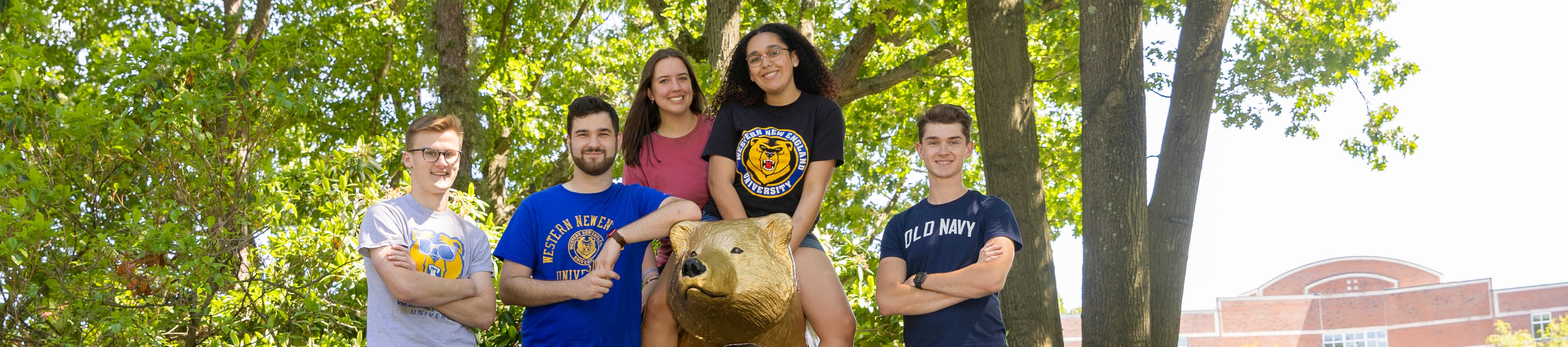 Students with the golden bear statue