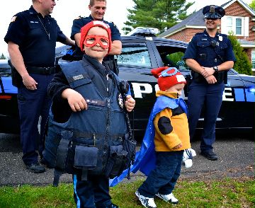 Xavier in police vest