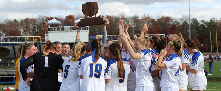 Womens soccer circled with trophy