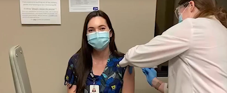 Pharmacy student getting vaccinated.
