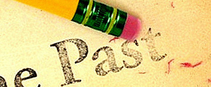 "The Past" being erased with a pencil eraser.