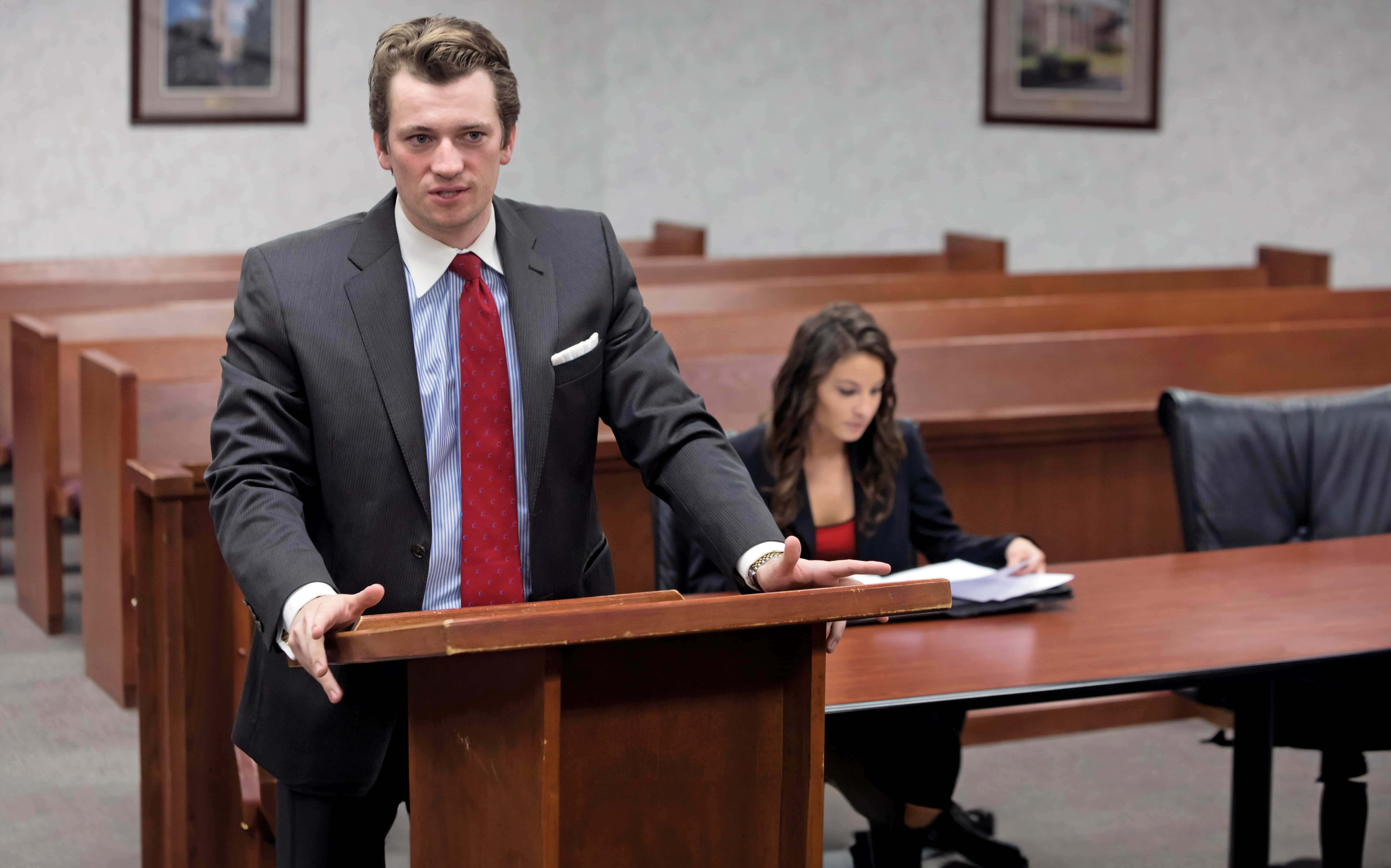 Law student in moot court room