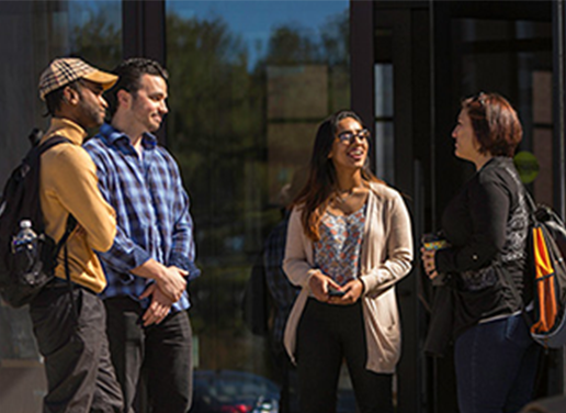 Students standing outside Law Center.