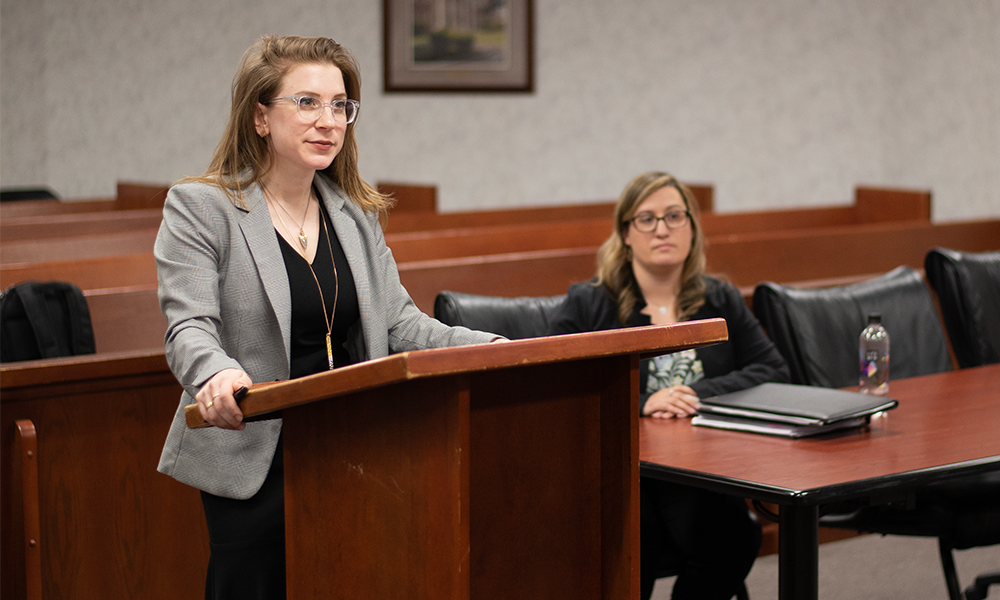 Students practicing in the WNE Moot court room