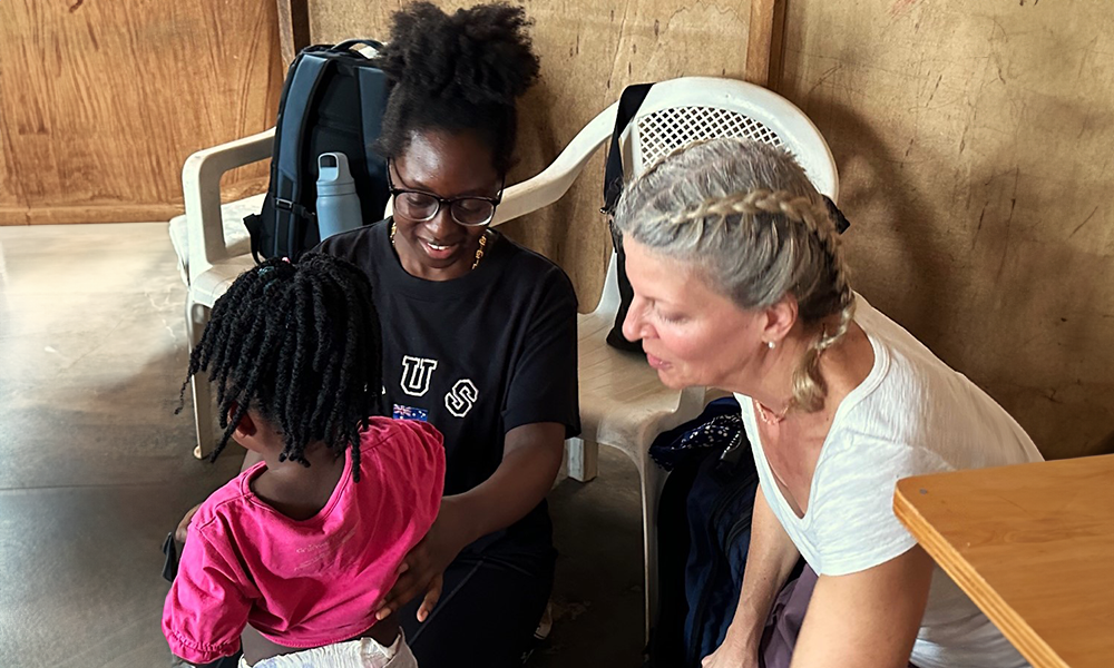 Dr. Melissa Mattison with fourth-year pharmacy student Nduta Njubi in Ghana, assisting with school health screenings