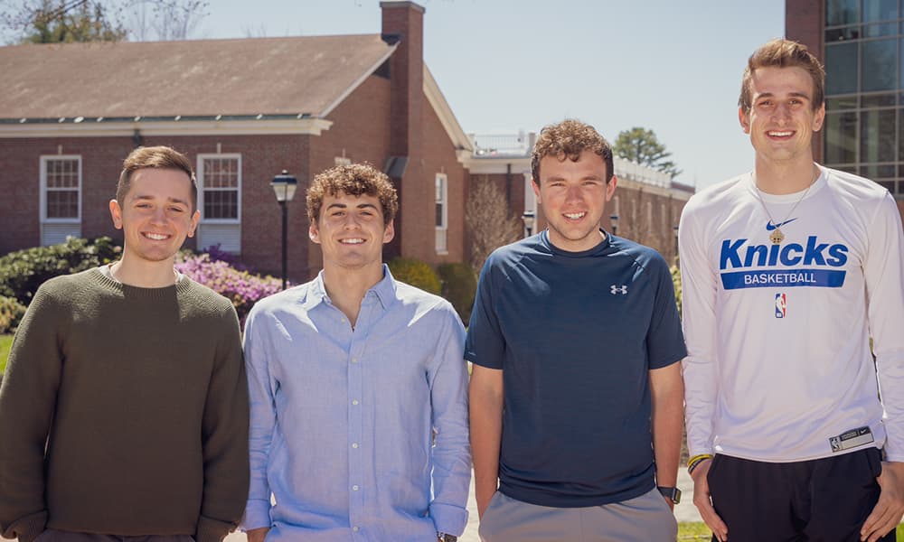 Pictured from (L to R): Sean O'Neil, President of Lambda Pi Eta, Louis Stabile, Kasen Sirois, and Joe EldredgPictured from (L to R): Sean O'Neil, President of Lambda Pi Eta, Louis Stabile, Kasen Sirois, and Joe Eldredge