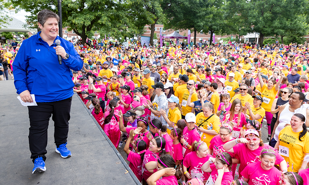 WNE Director of Athletics and Recreation Jenn Kolins welcomes Girls on the Run, Inc. in June 2024