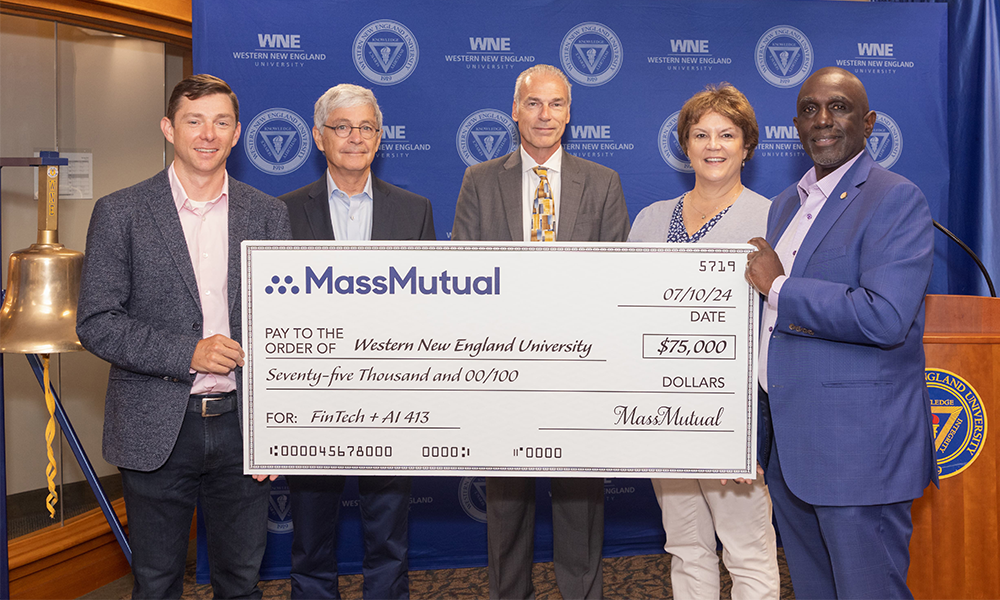 FinTech summer innovation fellowship participants stand with MassMutual and College of Business leadership 