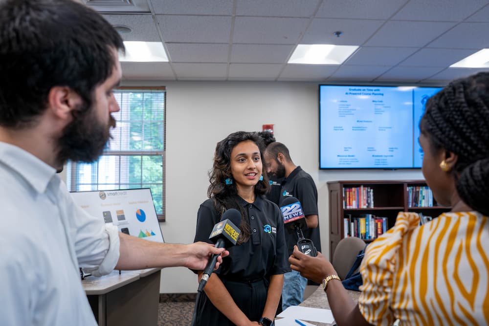 Female student being interviewed by WAMC and Channel 22.