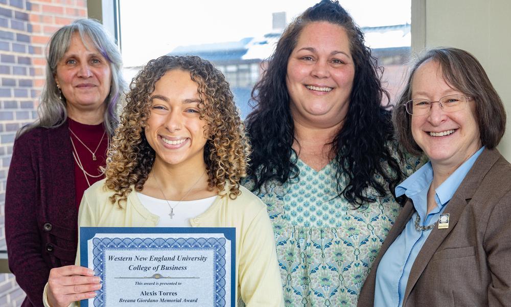 L-R in the picture are Dr. Janelle Goodnight, award recipient Alexis Torres, Alicia Powers mother of the student the memorial award is named after, and Dr. Elizabeth Elam.