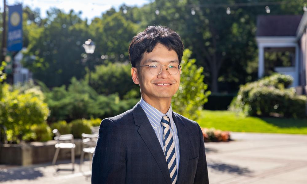 Outdoor headshot of Professor Qin Yin 