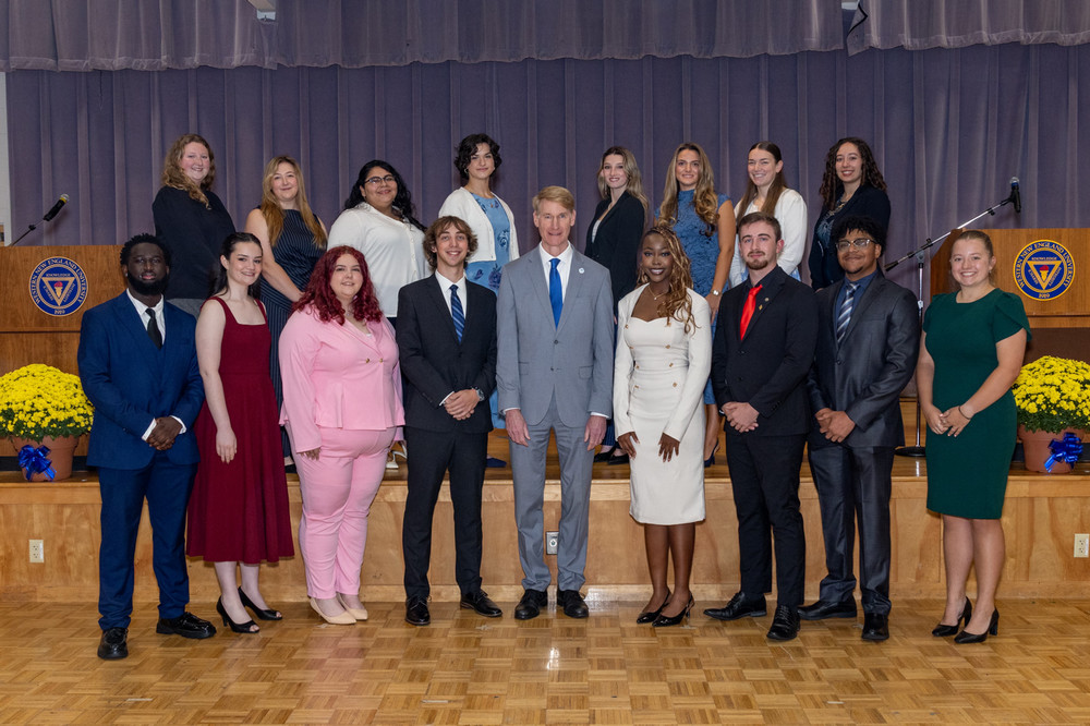 The 2026 recipients of Western New England University's Cupola Award of Excellence gather with President Joseph C. Hartman  following the annual recognition ceremony honoring student achievement, leadership, service, and campus involvement. 
