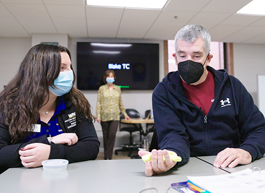 Student working with patient in BPC