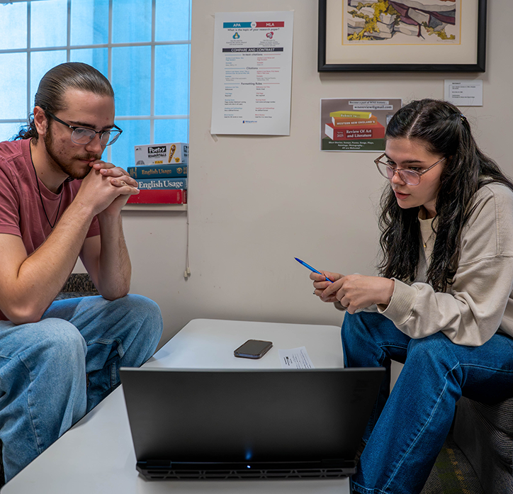 Students working together in the writing center