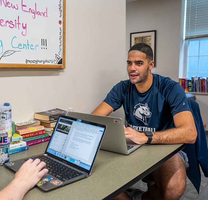 Students working together in the writing center